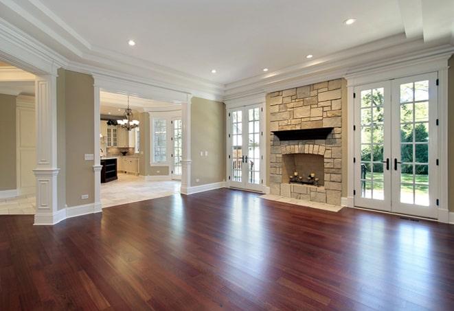 rich, dark wood flooring in a spacious, modern living room